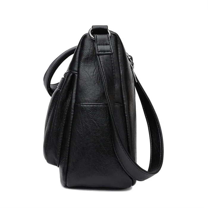 CZARNA TOREBKA CROSSBODY Warto™ - Wygoda i Funkcjonalność 24/7. Must-Have w Miejskiej Garderobie