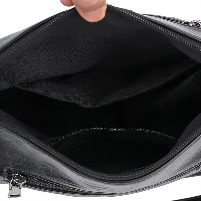 CZARNA TOREBKA CROSSBODY Warto™ - Wygoda i Funkcjonalność 24/7. Must-Have w Miejskiej Garderobie